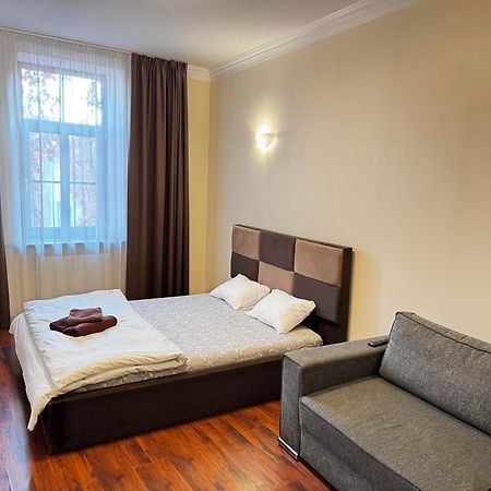 Aparthotel ريغا المظهر الخارجي الصورة A bedroom in a hotel