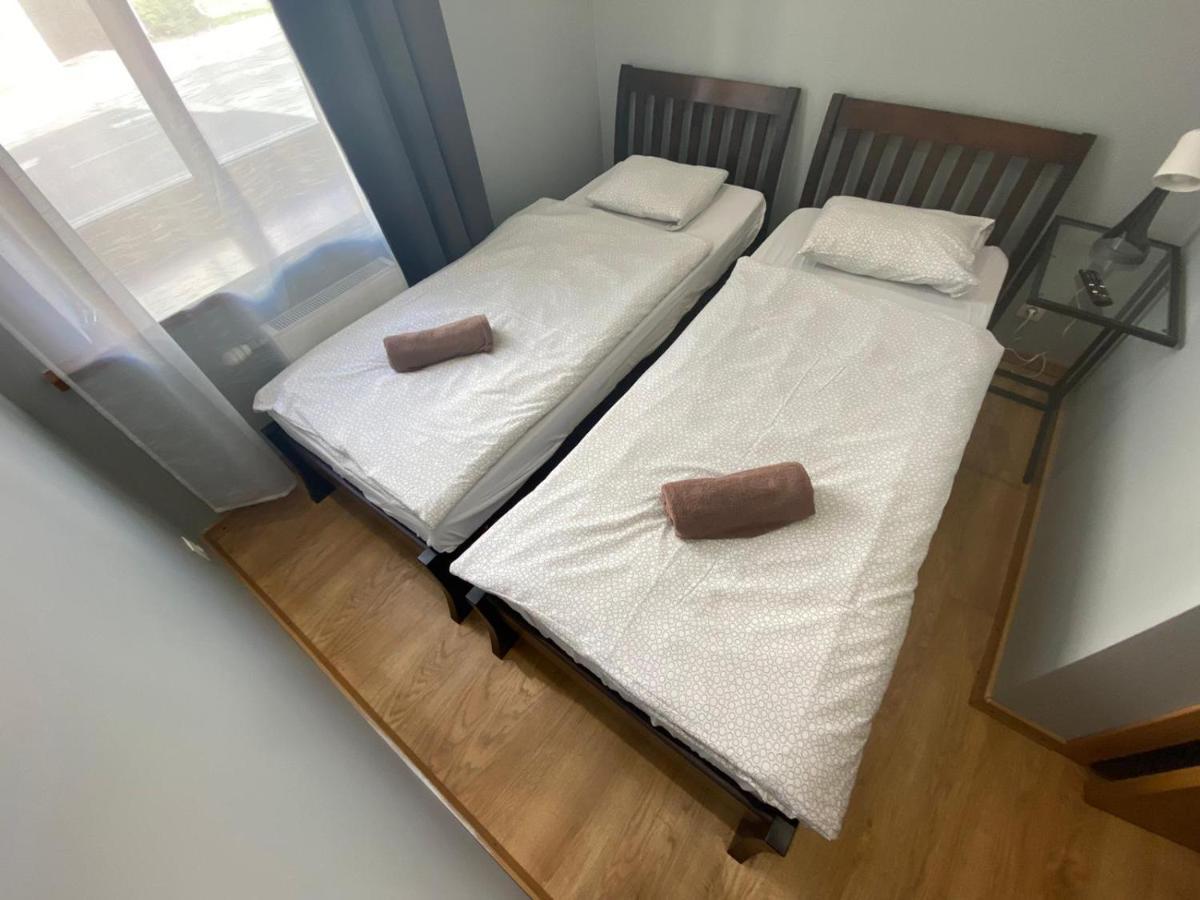 Aparthotel ريغا المظهر الخارجي الصورة Two single beds