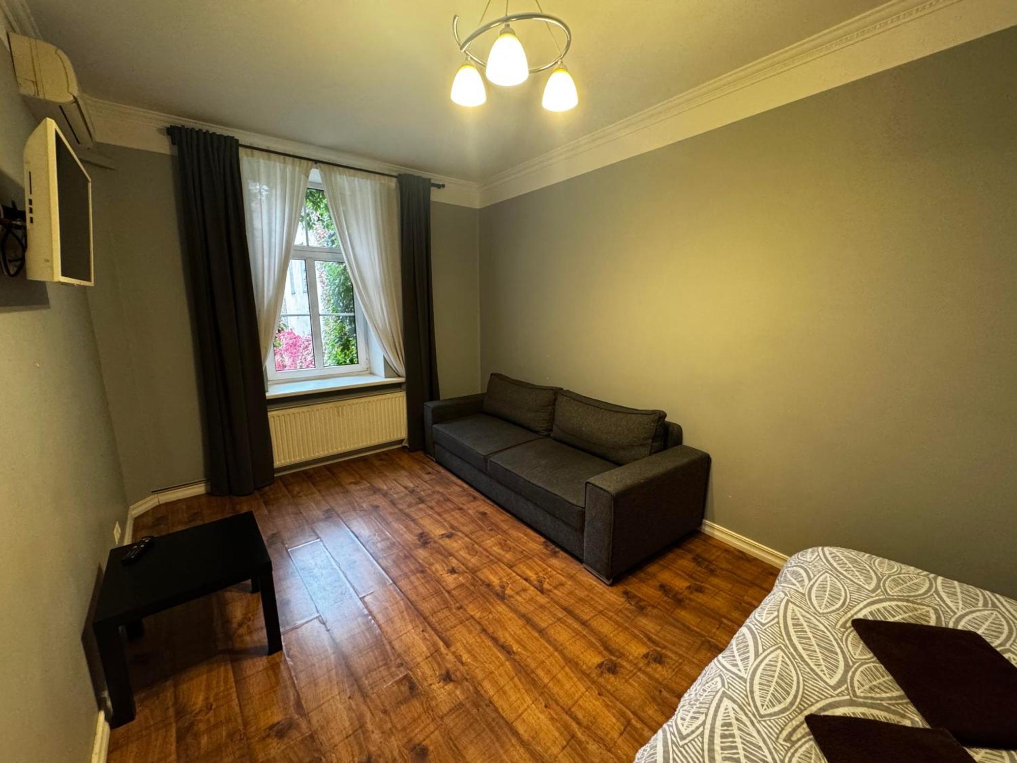 Aparthotel ريغا المظهر الخارجي الصورة A typical room at the hostel