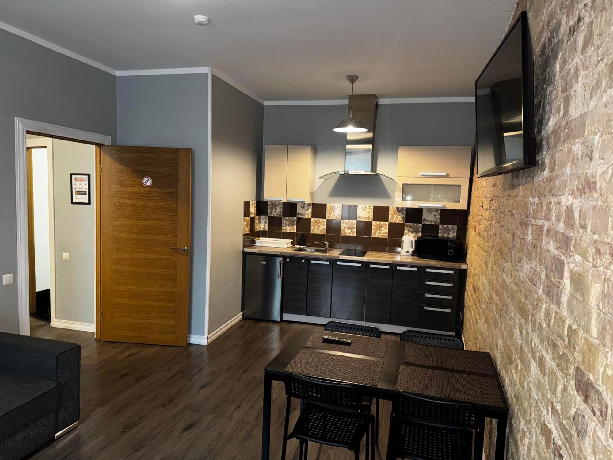 Aparthotel ريغا المظهر الخارجي الصورة A typical apartment at the University of Applied Sciences and Medical University of Southern Tyrol
