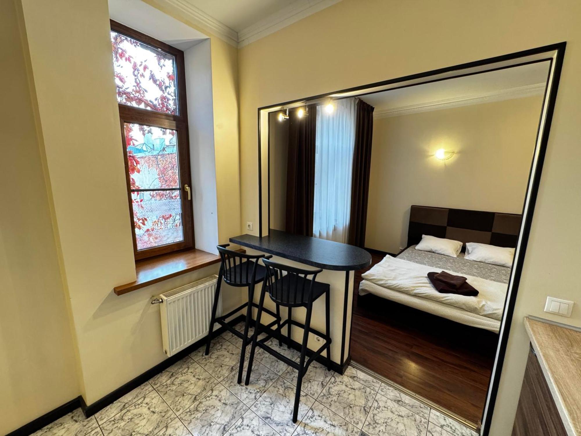 Aparthotel ريغا المظهر الخارجي الصورة A typical studio apartment
