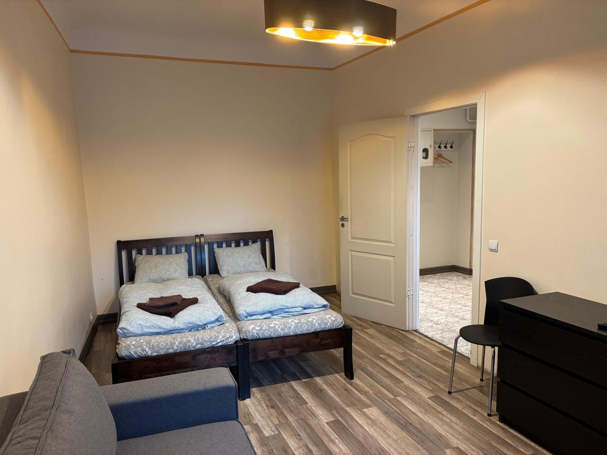 Aparthotel ريغا المظهر الخارجي الصورة A room at the hostel