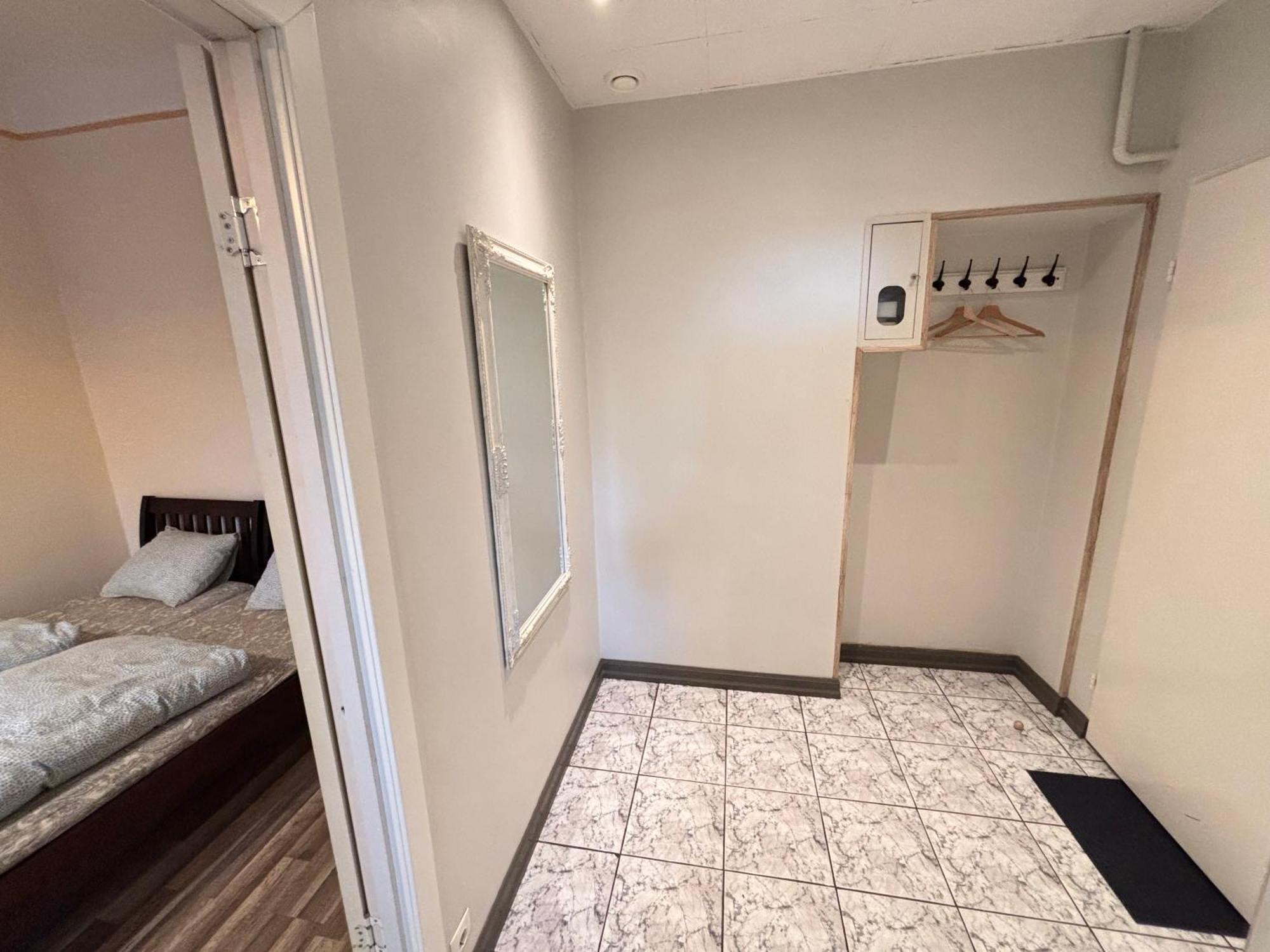 Aparthotel ريغا المظهر الخارجي الصورة A typical room at the hostel
