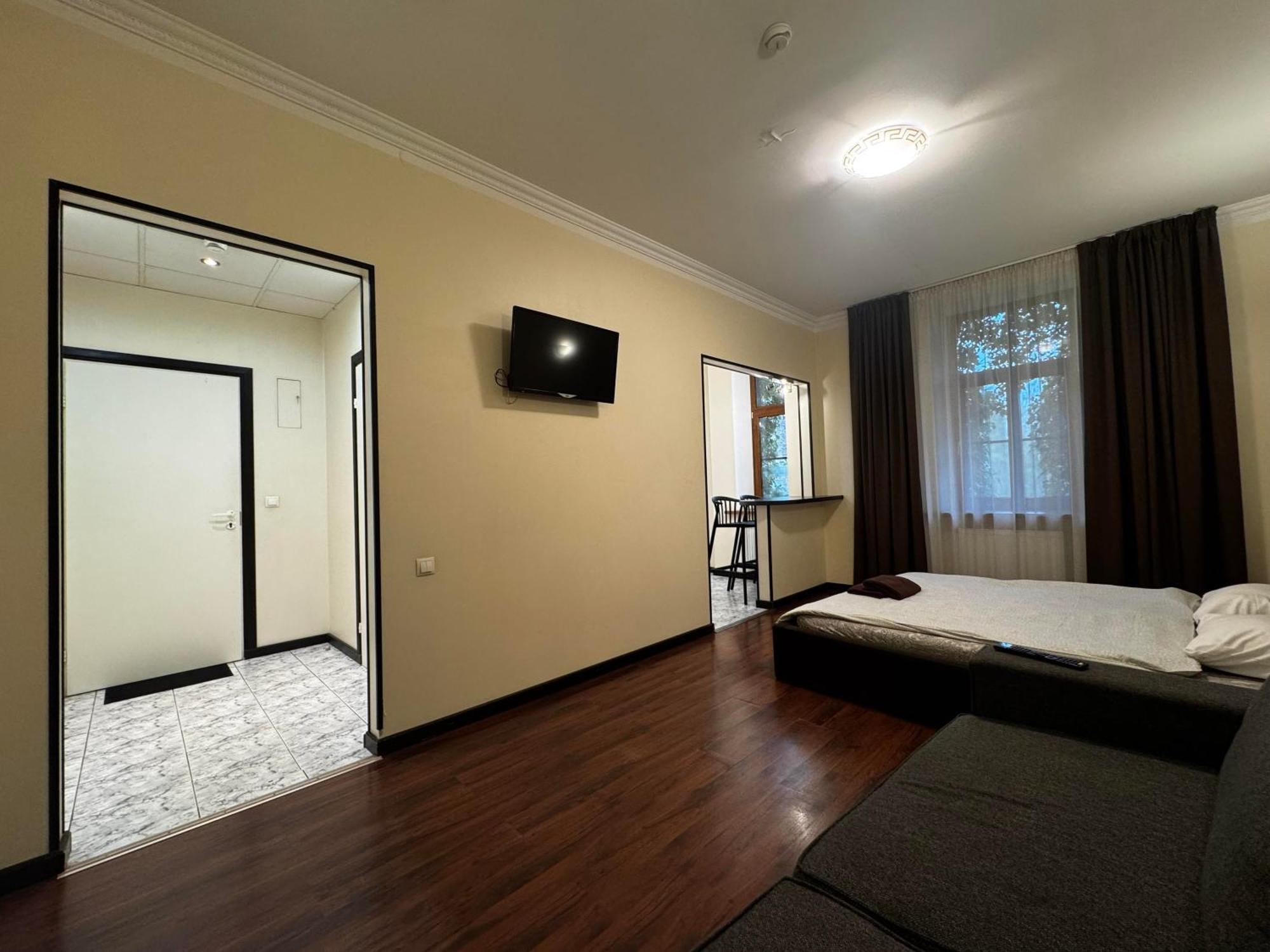 Aparthotel ريغا المظهر الخارجي الصورة A room at the hotel