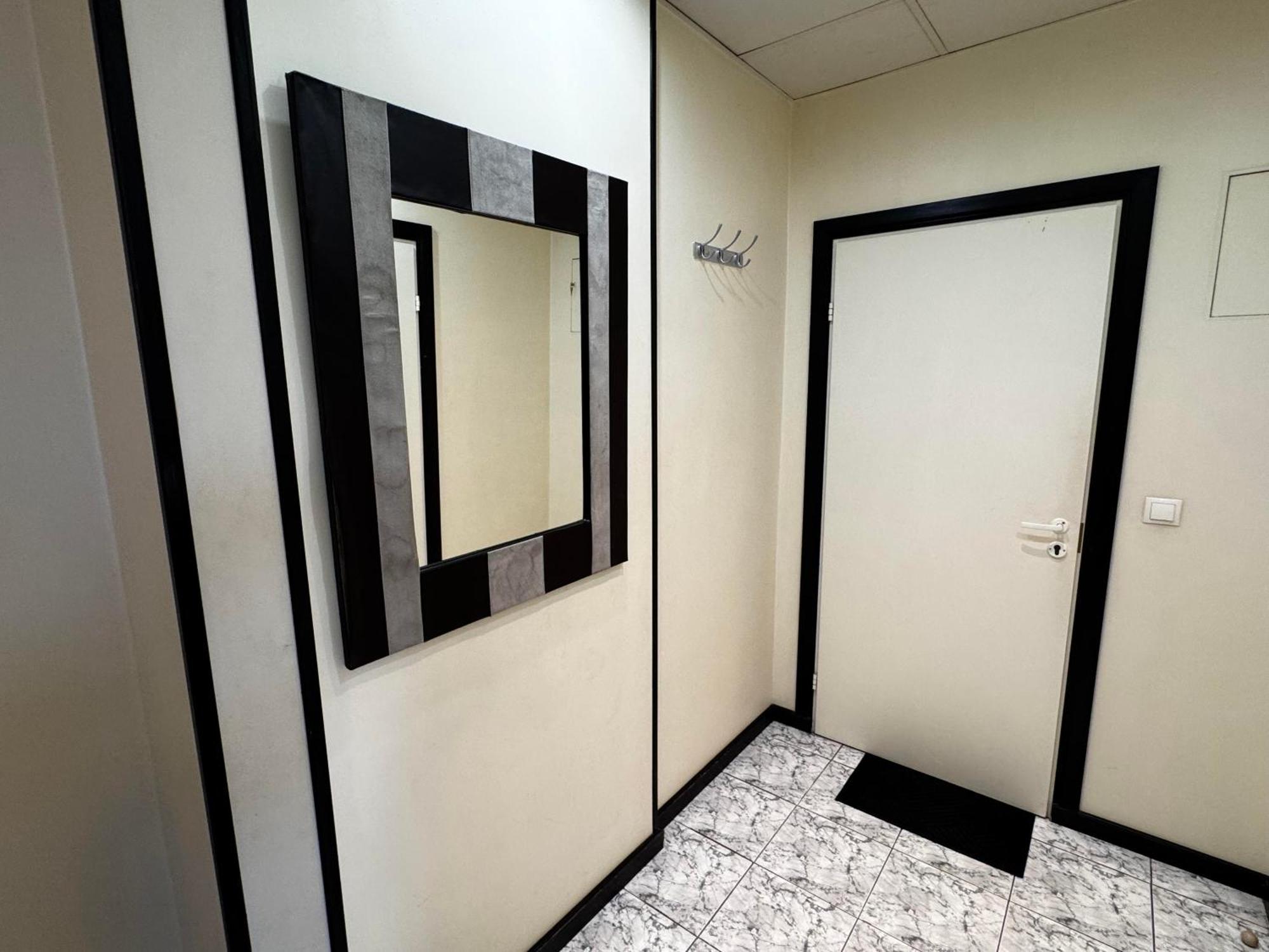 Aparthotel ريغا المظهر الخارجي الصورة A mirror in a bathroom