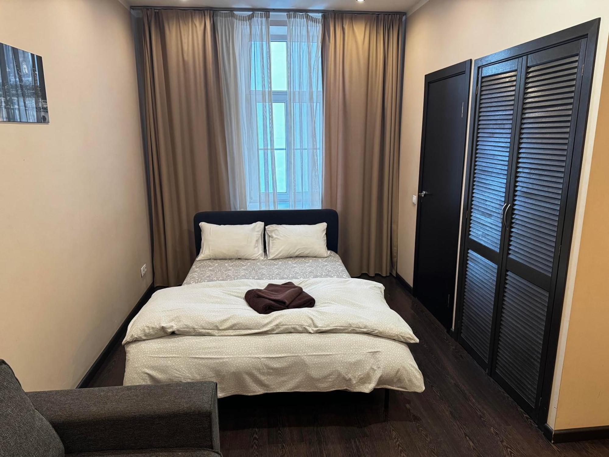Aparthotel ريغا المظهر الخارجي الصورة A room at the hotel