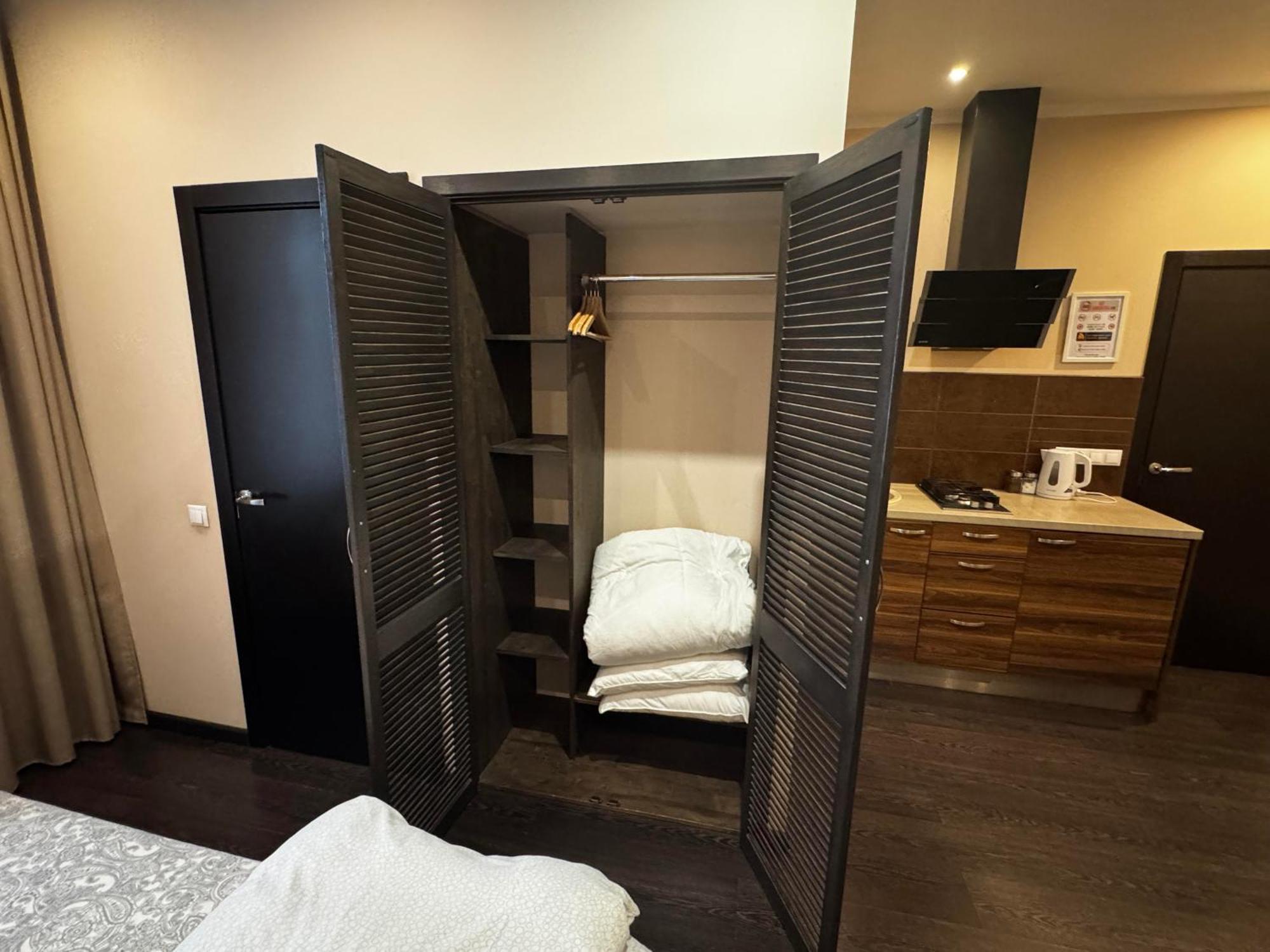 Aparthotel ريغا المظهر الخارجي الصورة A room at the hotel