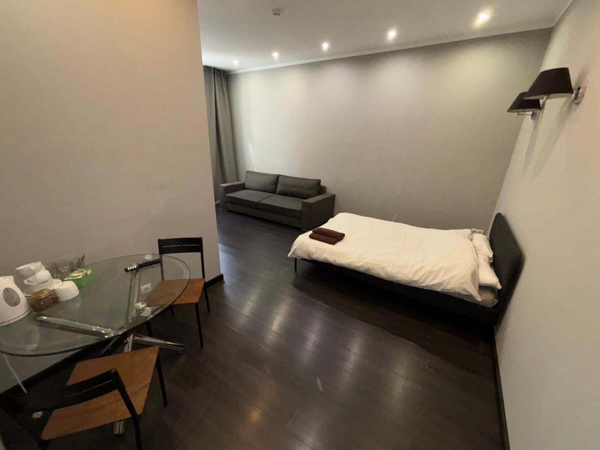 Aparthotel ريغا المظهر الخارجي الصورة A room at the hotel
